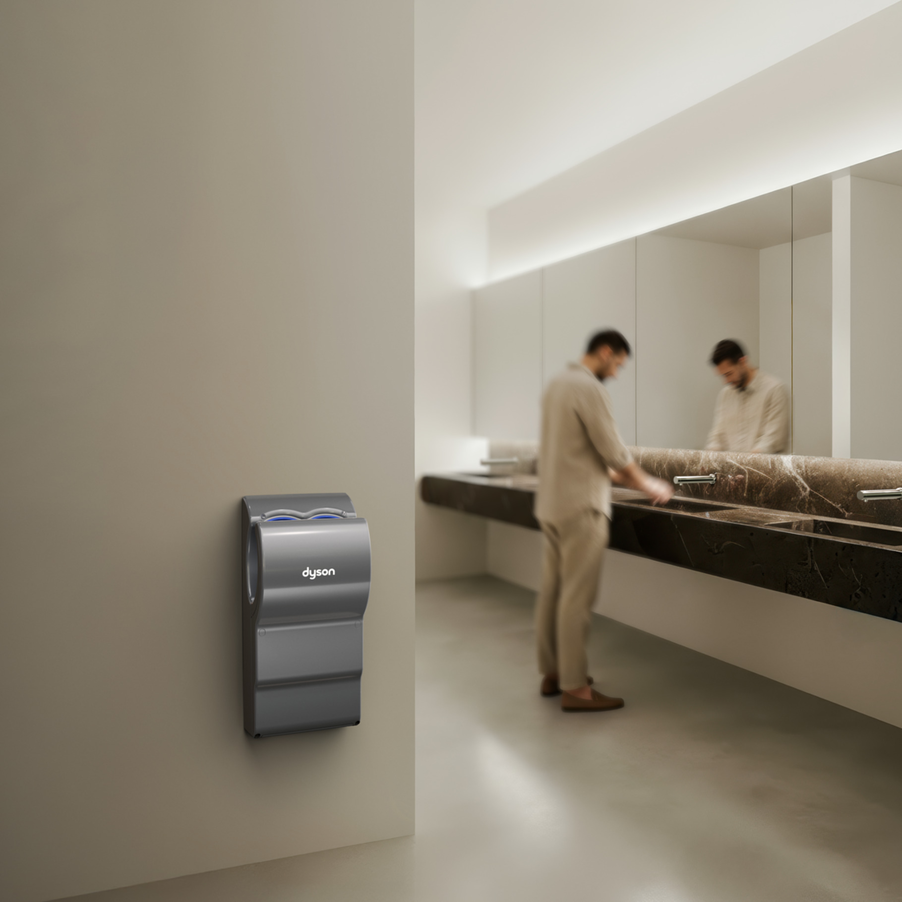 Dyson Airblade dB AB14 hands-in hand dryer installed in a commercial restroom