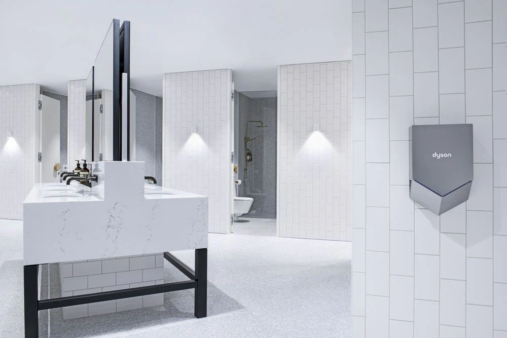 Dyson Airblade V HU02 installed in a modern commercial restroom