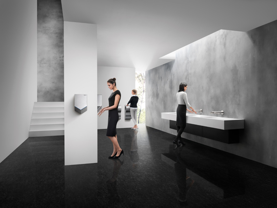dyson-airblade-hu02-restroom1.jpg A woman using the Dyson Airblade